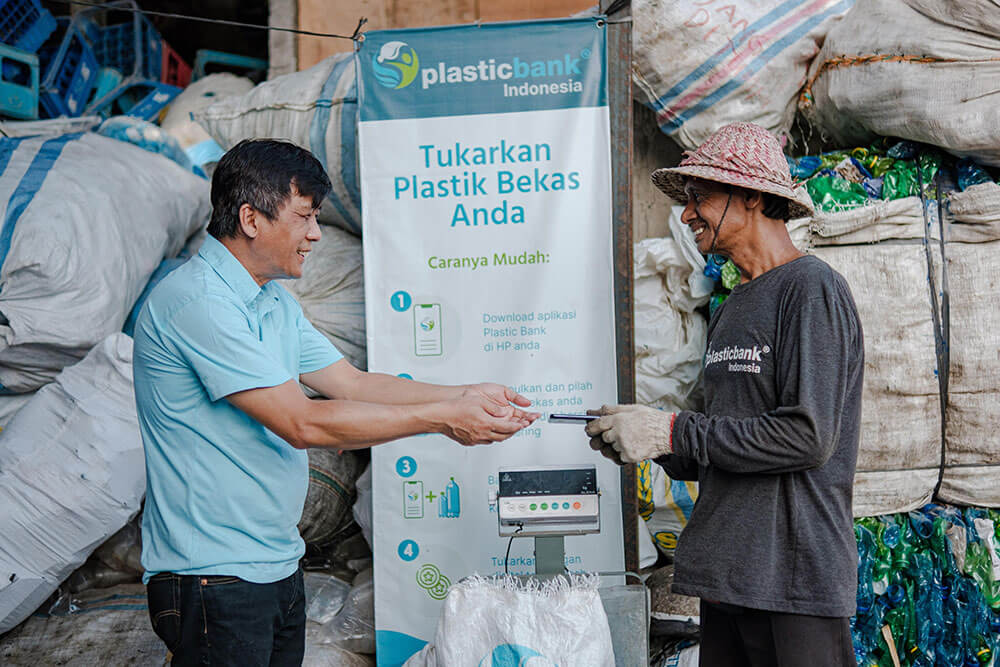 Collection member at Plastic Bank collection branch