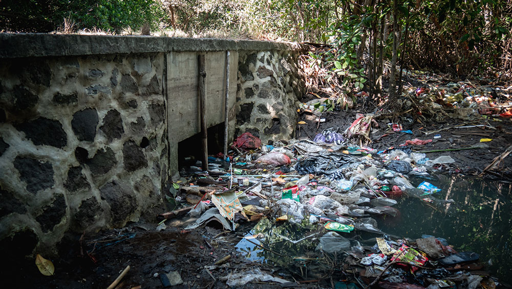 Plastic waste enters the ocean through waterways in Indonesia
