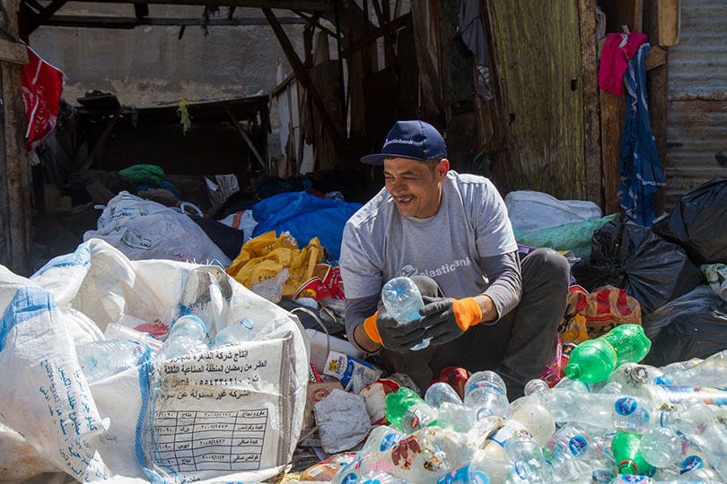 Sorting plastic bottles at Collection Point in Manshiyet Nasser community,Feb 2022